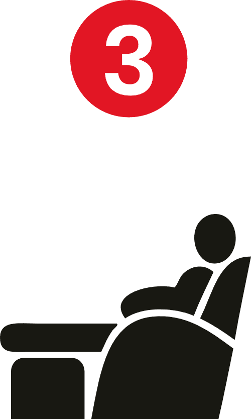 Person sitting in recliner with red circle