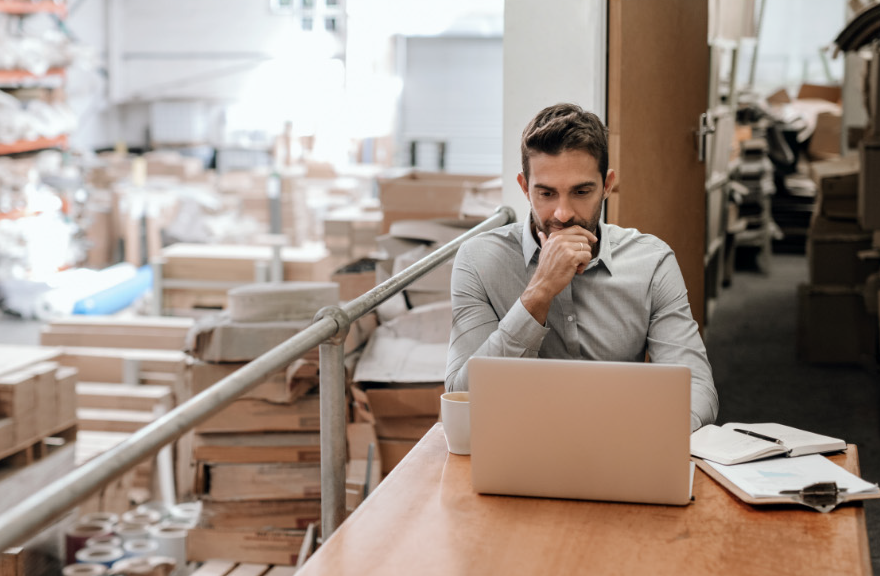 Man with a laptop and coffee